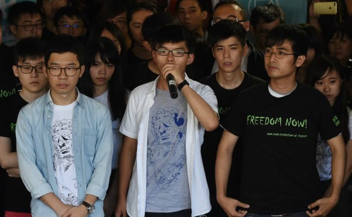 Nathan Law, Joshua Wong şi Alex Chow (Anthony Wallace / AFP / Getty Images)