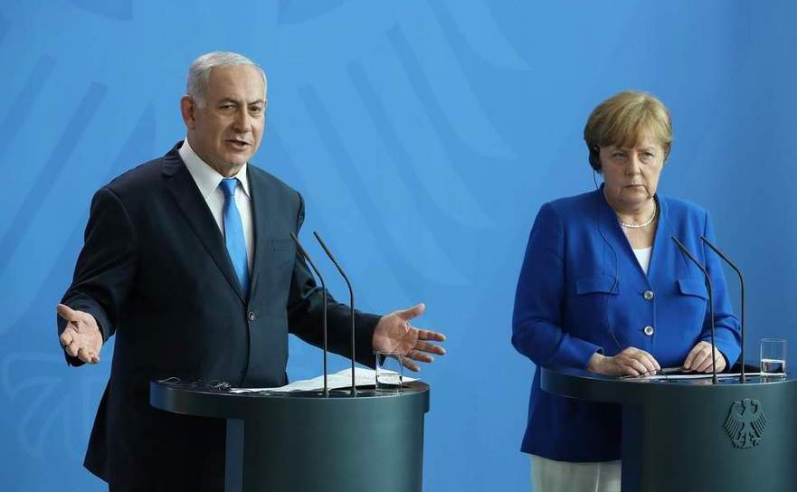 Cancelarul german Angela Merkel şi premierul israelian Benjamin Netanyahu participă la o conferinţă comună de presă, ca parte a unei întâlniri la sediul Canceleriei din Berlin, Germania, 4 iunie 2018.