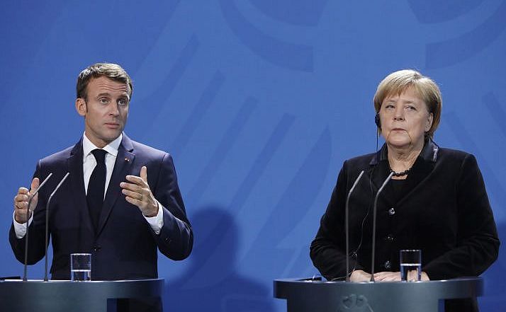 Cancelarul german Angela Merkel şi preşedintele francez Emmanuel Macron