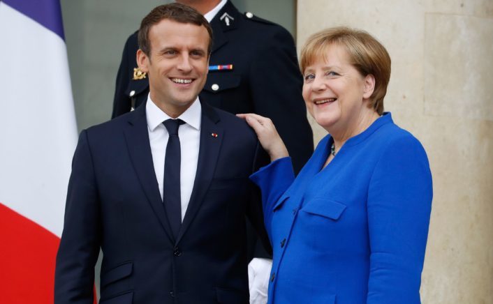 Cancelarul german Angela Merkel şi preşedintele francez Emmanuel Macron (Patrick Kovarik/AFP/Getty Images)