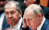 Serghei Lavrov, Vladimir Putin - arhivă (POOL/AFP via Getty Images)