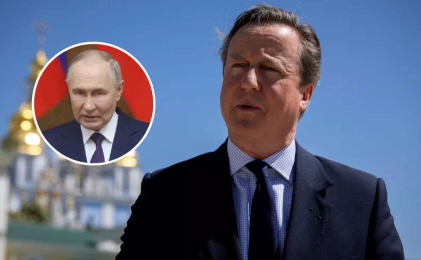 Vladimir Putin (st) şi ministrul de Externe al Marii Britanii, David Cameron