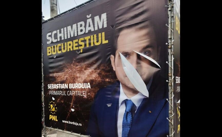 Panou electoral cu Sebastian Burduja vandalizat