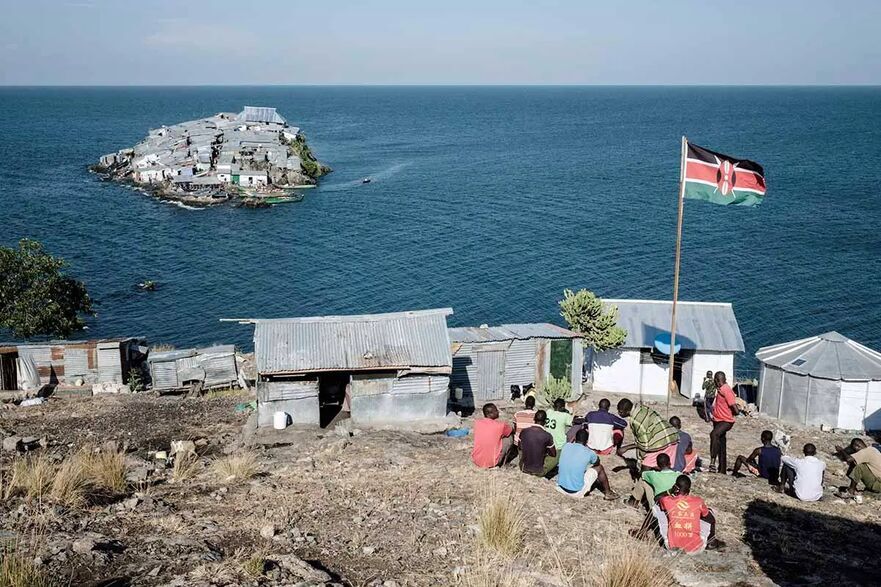 Pe insula Migingo au fost arborate atât steagul kenyan, cât şi cel ugandez de-a lungul mai multor decenii, ceea ce a dus la controverse. (Yasuyoshi Chiba/AFP via Getty Images)