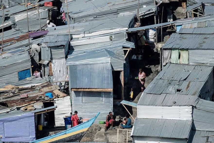 Insula Migingo este descrisă ca o ţestoasă de tablă pe o mică stâncă dintr-un lac. (Yasuyoshi Chiba/AFP via Getty Images)