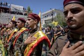 Membrii ai grupării Hezbollah, la o comemorare, iunie 2024 (Chris McGrath/Getty Images)
