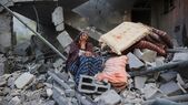 Locuinţe palestiniene distruse de bombardamentele israeliene (Eyad Baba/AFP/Getty Images)